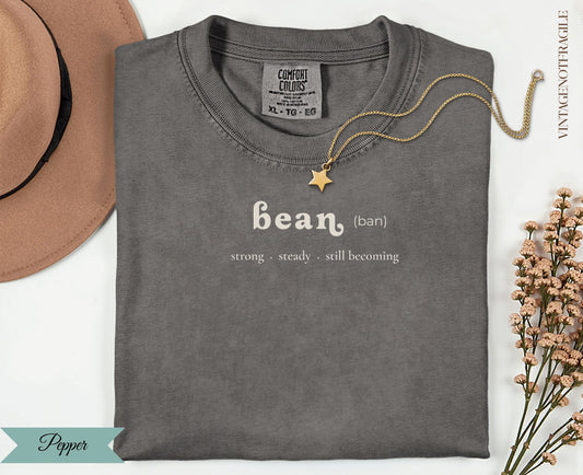 Comfort Colors grey t-shirt with "bean (ban)" text and flower embellishments.