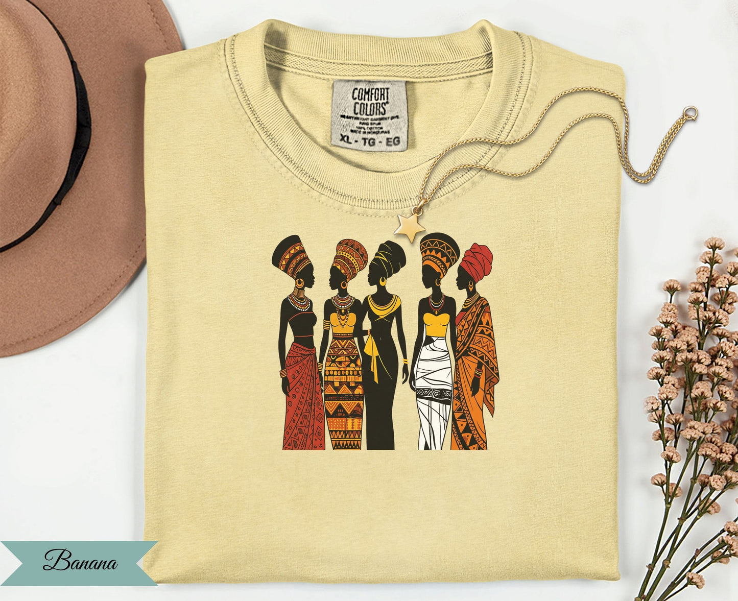Five women in African-inspired clothing stand together.
