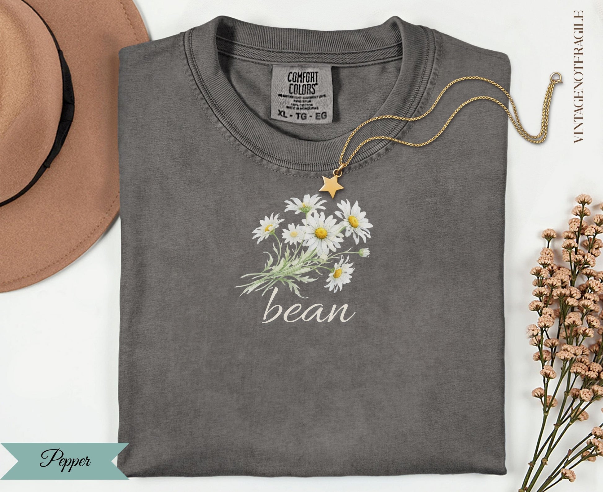 Charcoal t-shirt with daisy bouquet graphic and "bean" text.