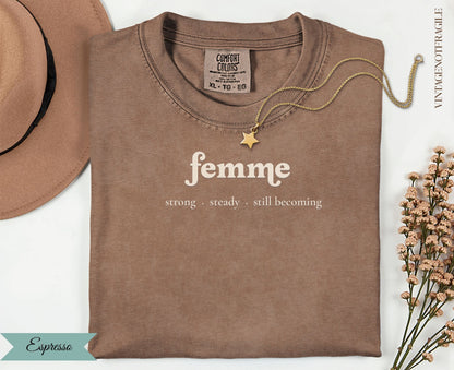 Espresso Comfort Colors t-shirt with "femme strong steady still becoming" text.