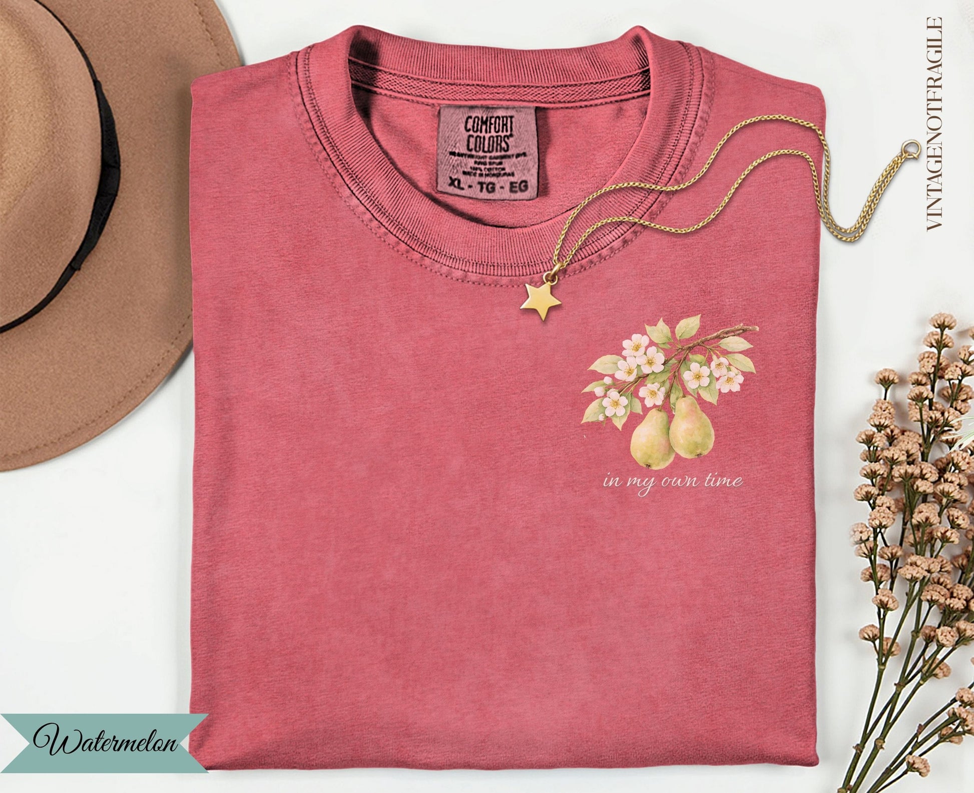 Pink t-shirt with pears and flowers, "in my own time" text.