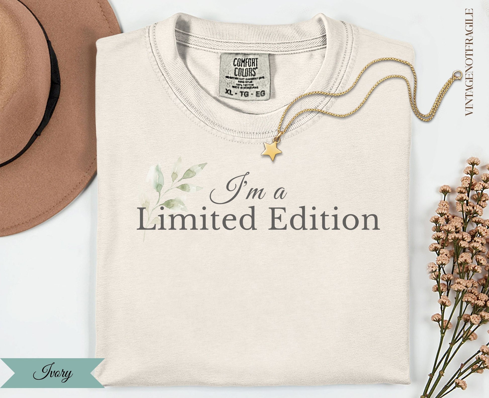 Cream t-shirt with "I'm a Limited Edition" text and floral accents.