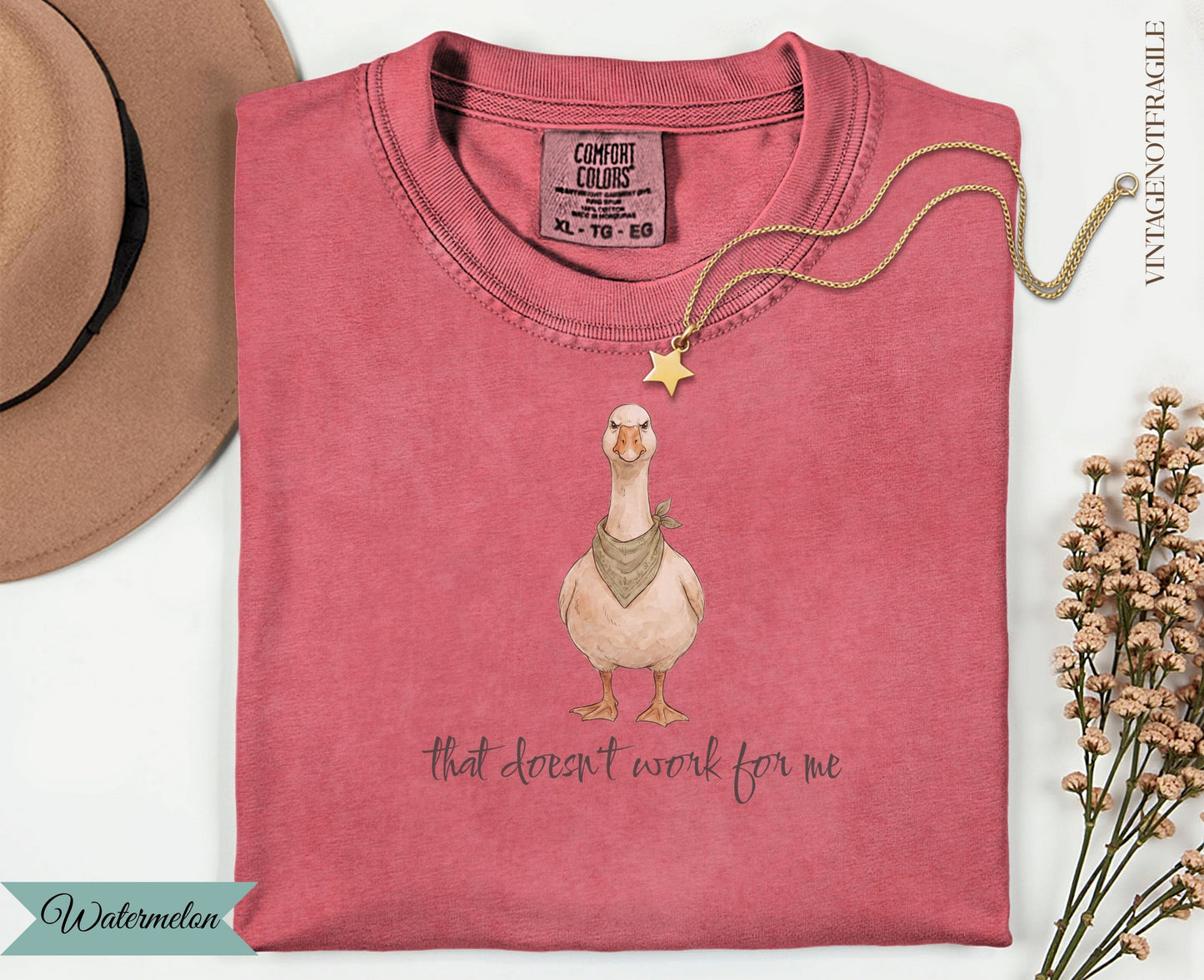T-shirt with goose graphic and text "that doesn't work for me"