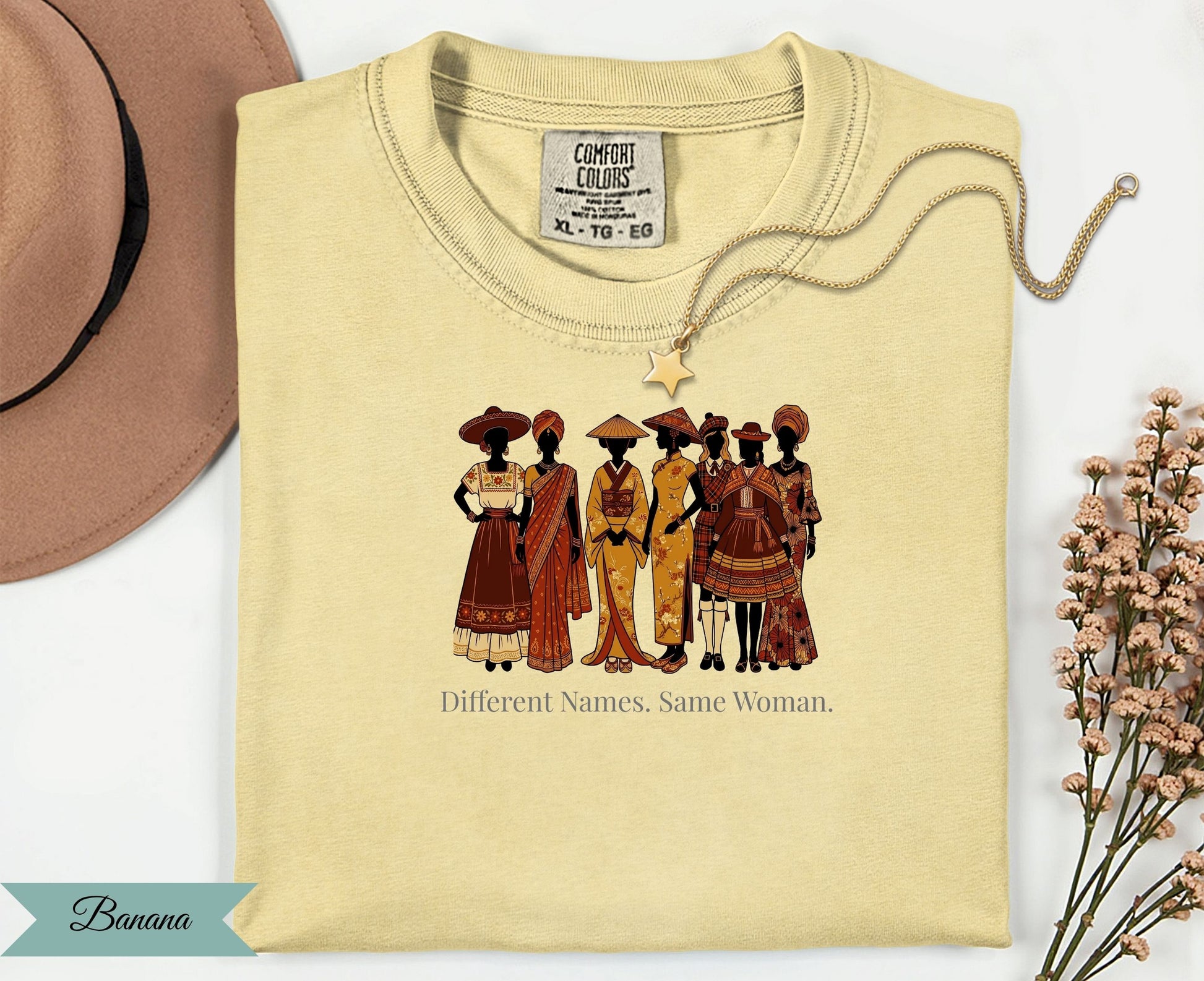 Light yellow t-shirt with graphic of diverse women and text "Different Names. Same Woman."