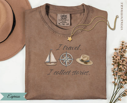 Brown t-shirt with "I travel. I collect stories." and nautical illustrations.