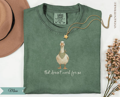 Green t-shirt with goose graphic and text "that doesn't work for me".