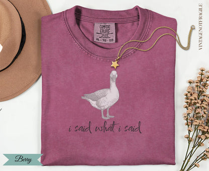 Berry Comfort Colors t-shirt with goose graphic and text "I said what I said".