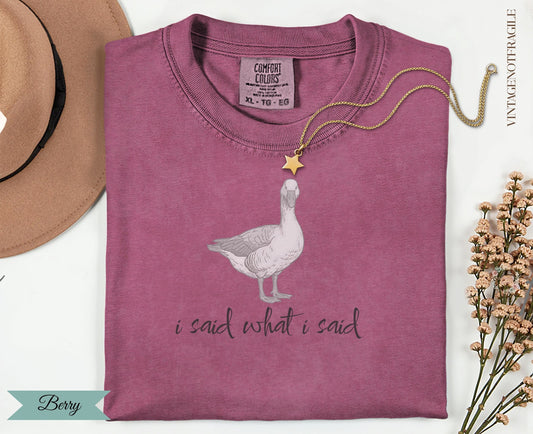 Berry Comfort Colors t-shirt with goose graphic and text "I said what I said".