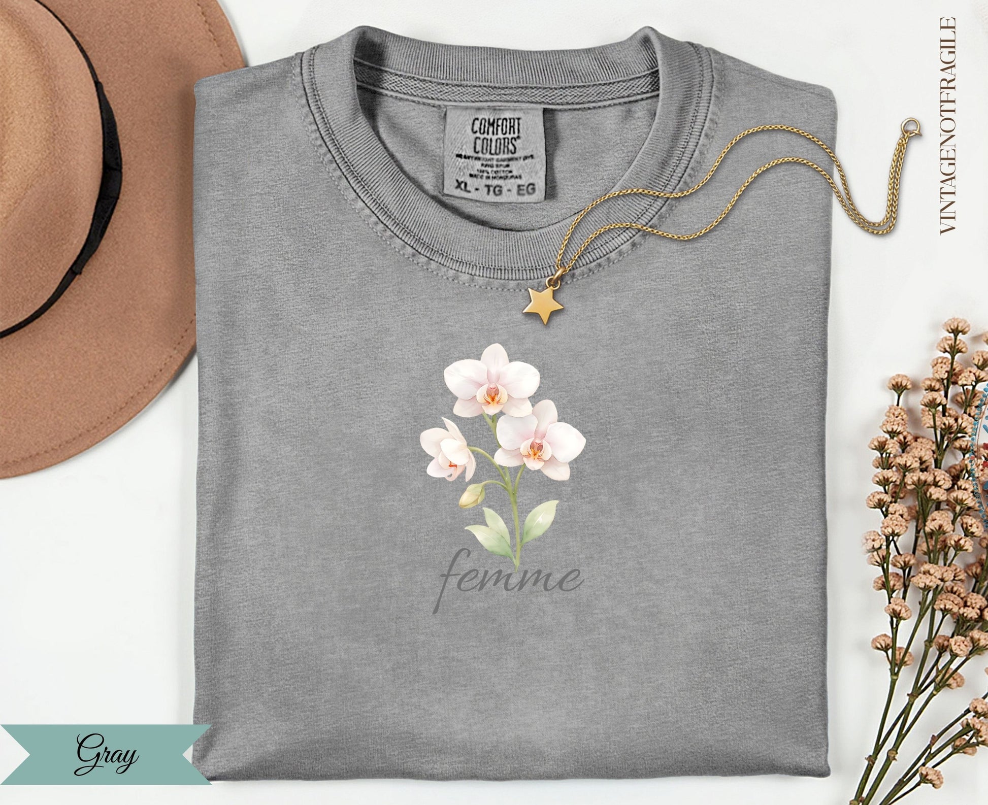 Gray t-shirt with "femme" and floral orchid design.