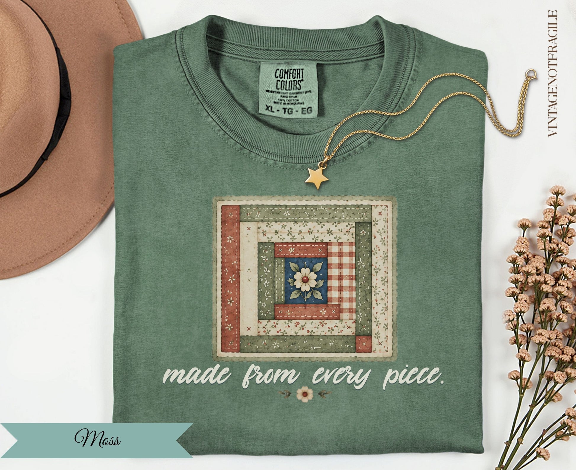 Green t-shirt with a quilt-like graphic and "made from every piece." text.
