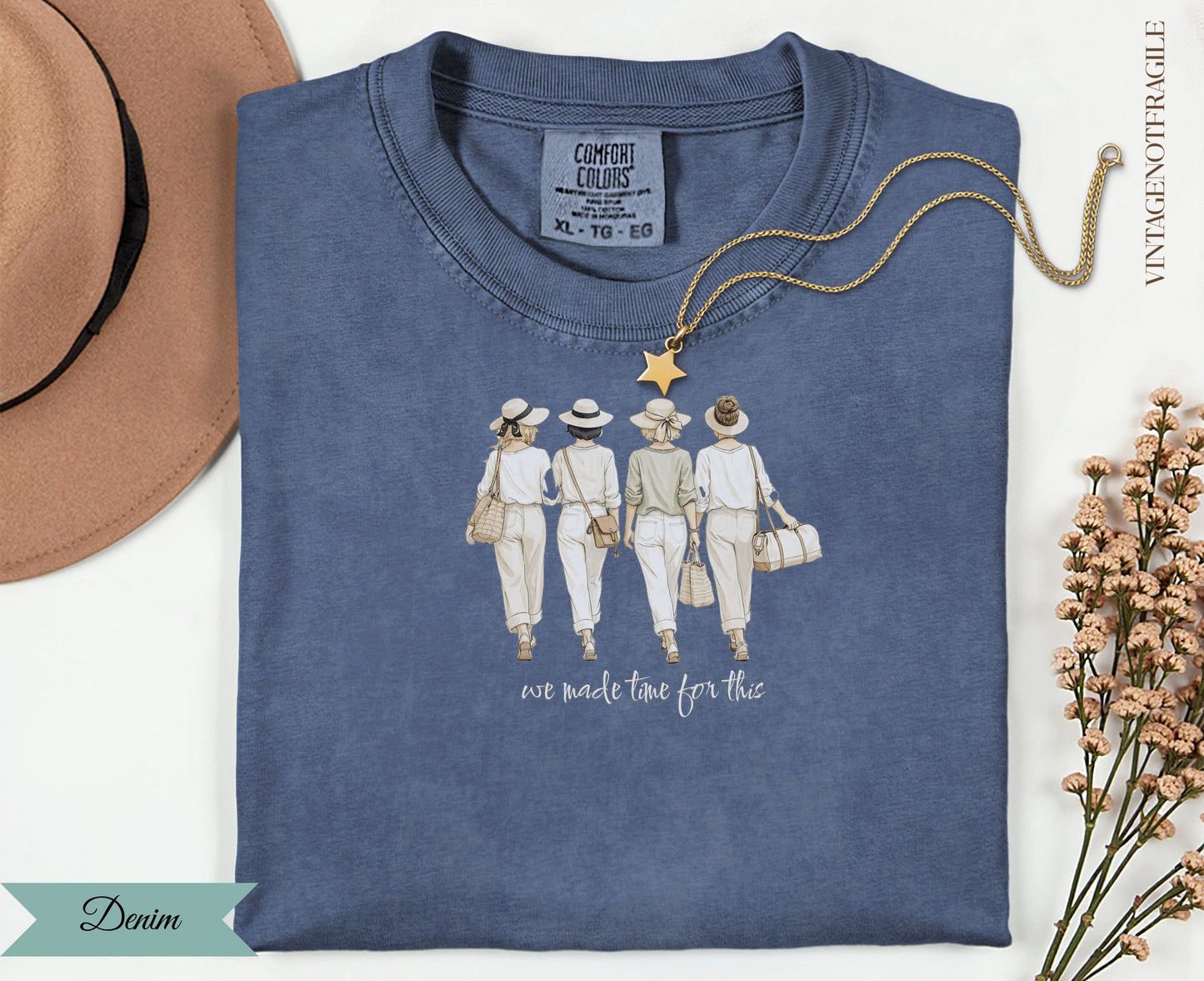 Blue Comfort Colors t-shirt with graphic of four women and text "we made time for this".