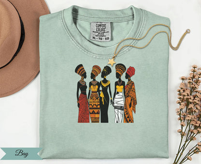 T-shirt with five women in colorful African-inspired attire.