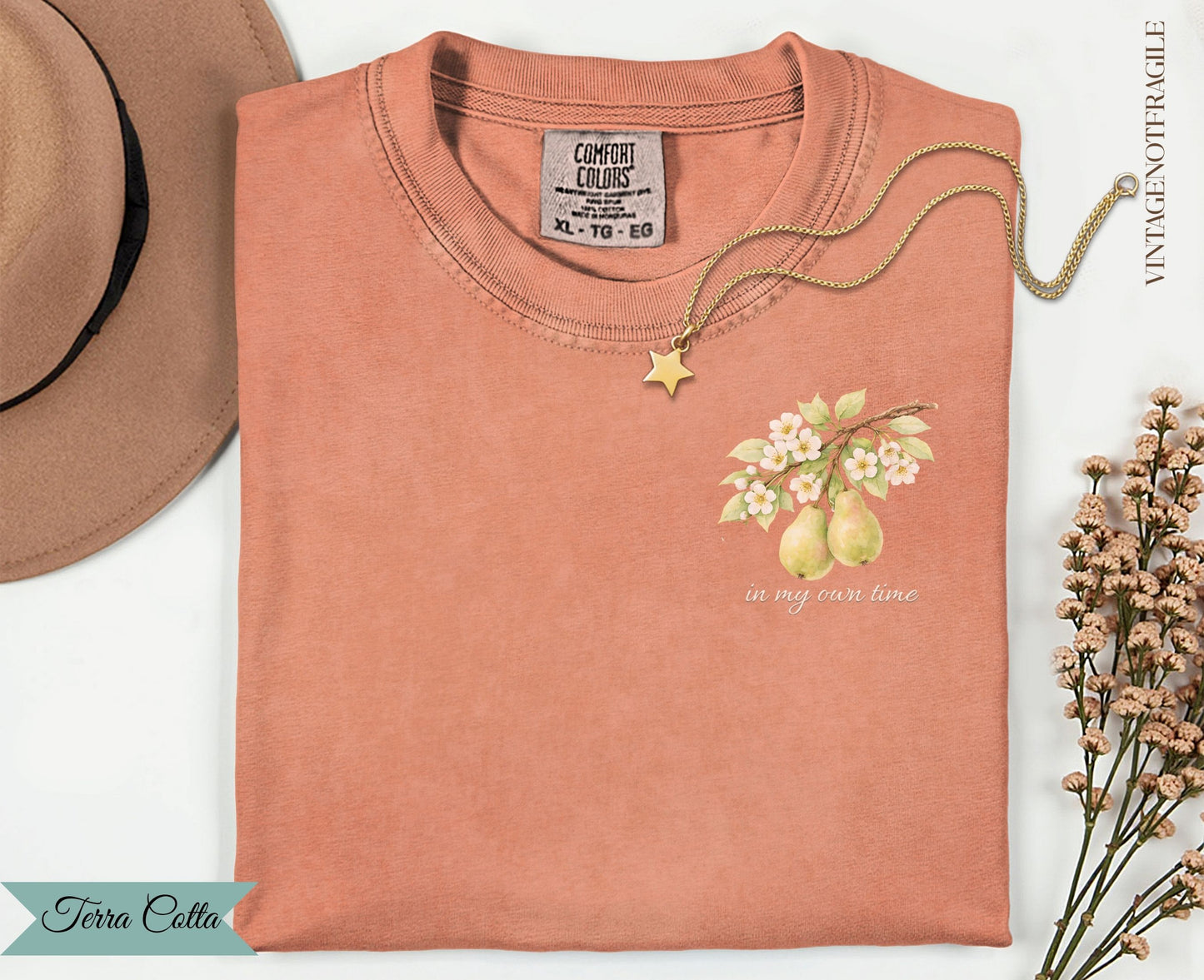 Salmon comfort colors t-shirt with pear floral graphic and "in my own time" text.