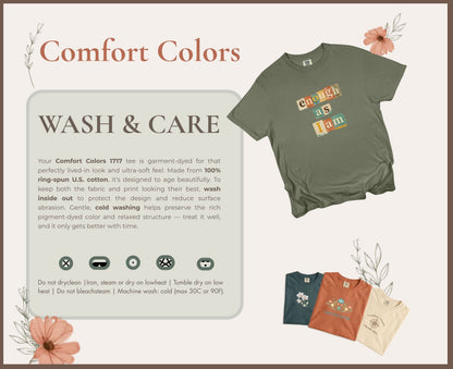 Comfort Colors 1717 garment-dyed tee with "enough as I am" graphic and wash care instructions.
