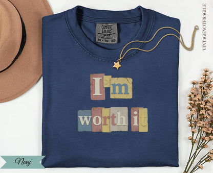 Navy Comfort Colors t-shirt with "I'm worth it" text and star detail.