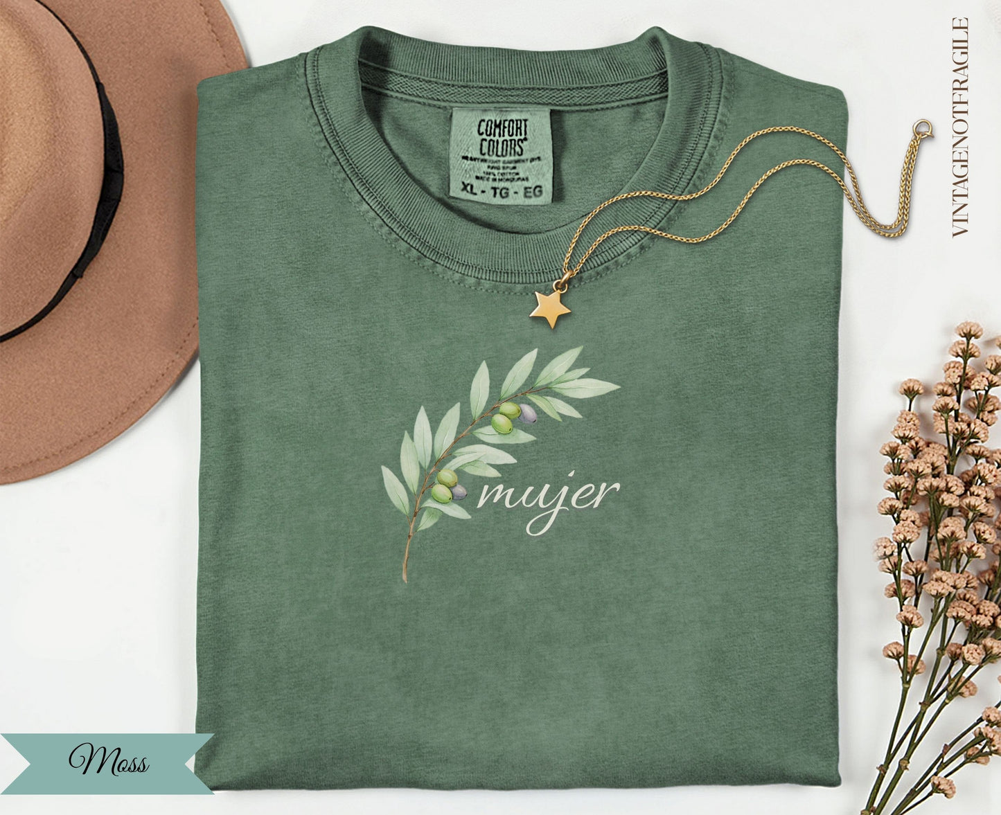 Green t-shirt with olive branch and "mujer" text.