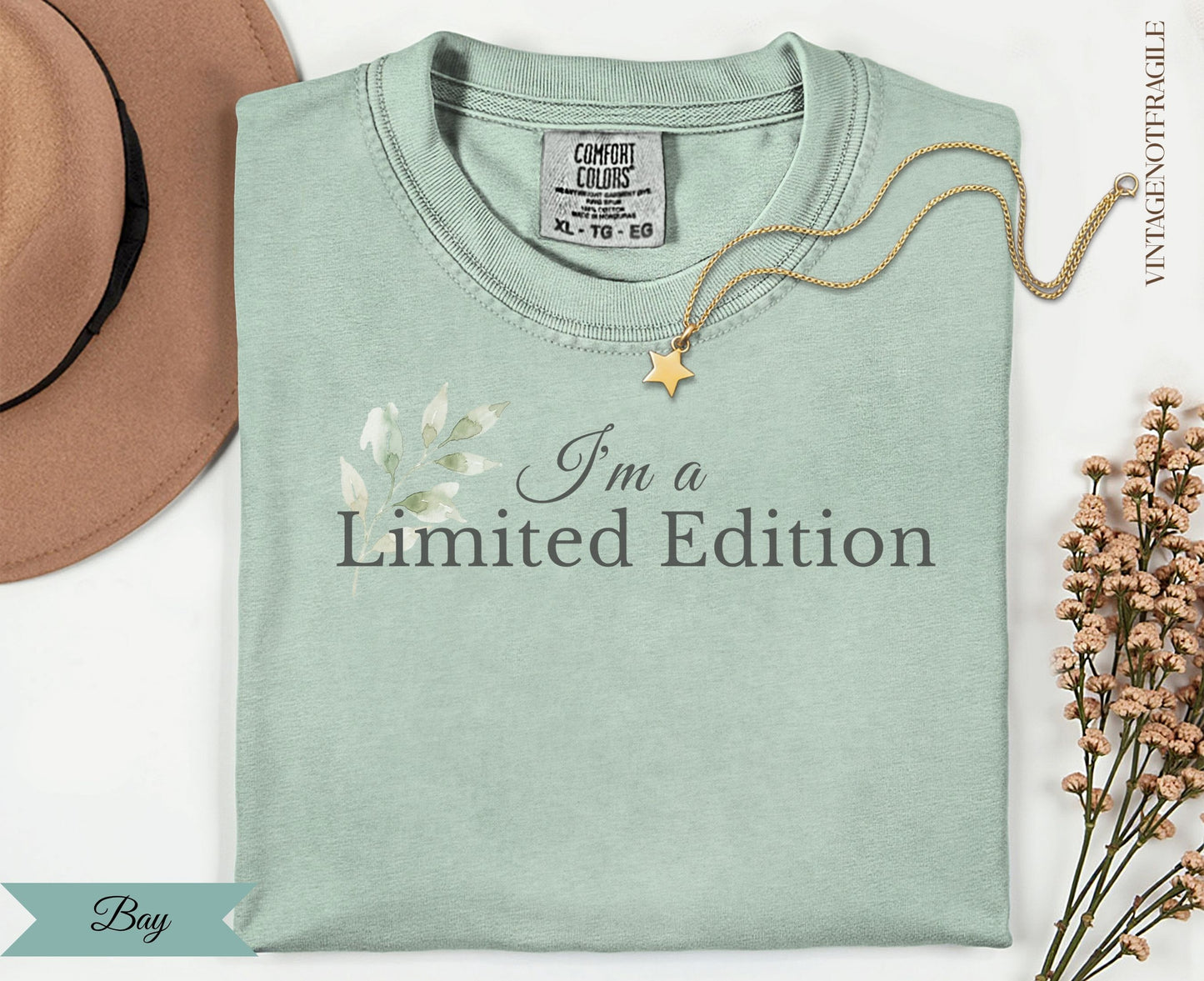 Light green t-shirt with "I'm a Limited Edition" text and floral graphic.