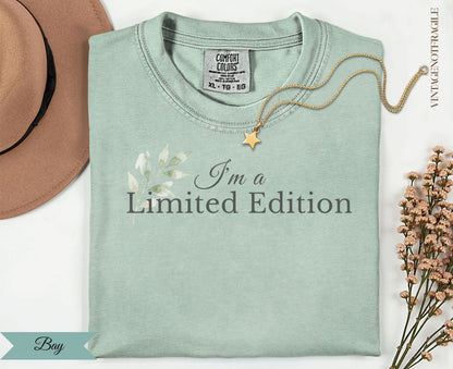 Light green t-shirt with "I'm a Limited Edition" text and floral graphic.