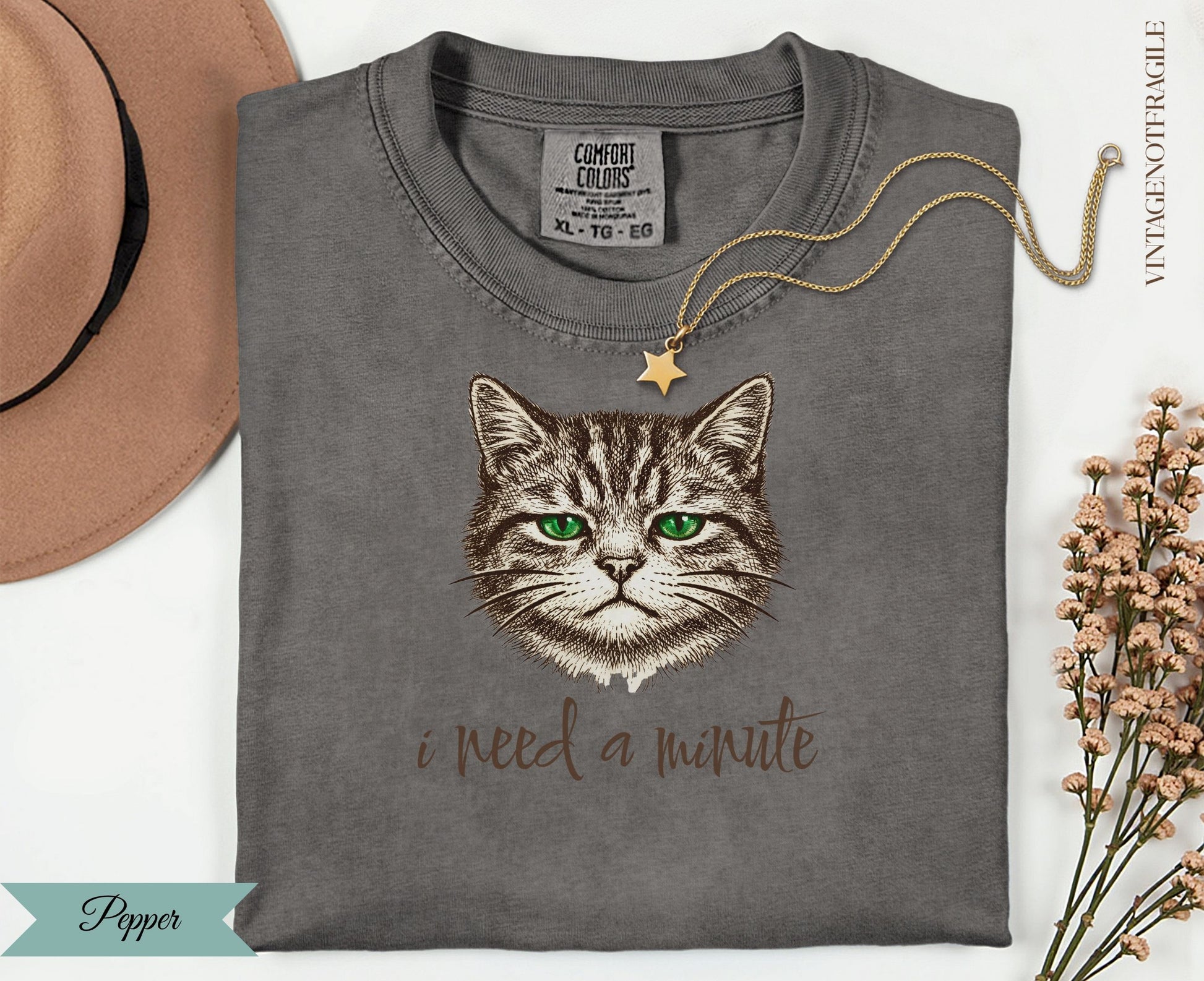 Comfort Colors t-shirt with a cat graphic and "I need a minute" text.