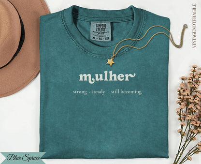 Teal Comfort Colors t-shirt with "mulher strong steady. still becoming" text.