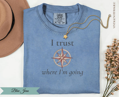 Blue Jean comfort colors t-shirt with compass graphic and text "I trust where I'm going".