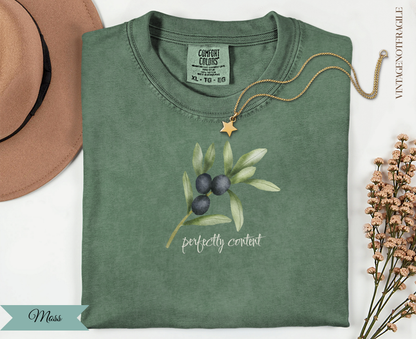 Green t-shirt with olive branch graphic and "perfectly content" text.