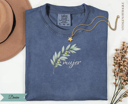Blue t-shirt with olive branch design and "mujer" text.