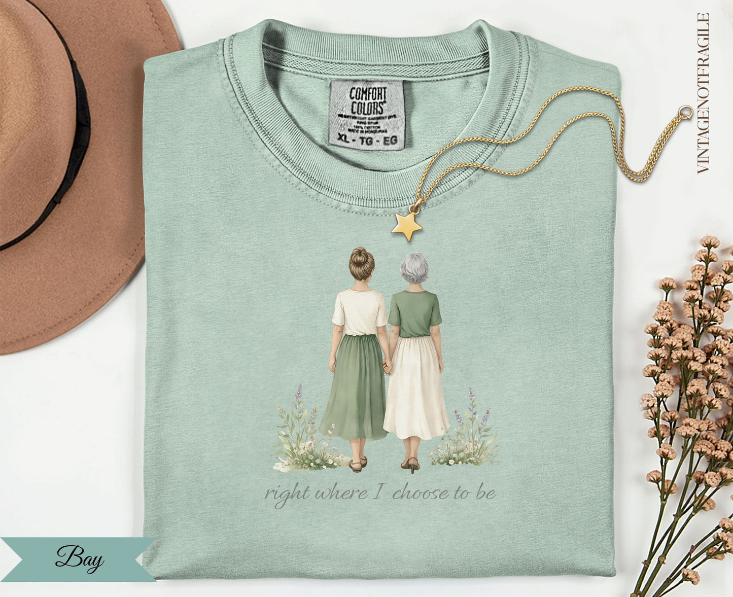 T-shirt with two women holding hands and text "right where I choose to be".