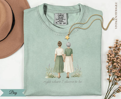 T-shirt with two women holding hands and text "right where I choose to be".