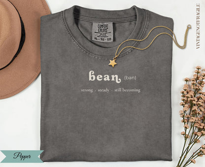 Comfort Colors grey t-shirt with "bean (ban)" text and flower embellishments.