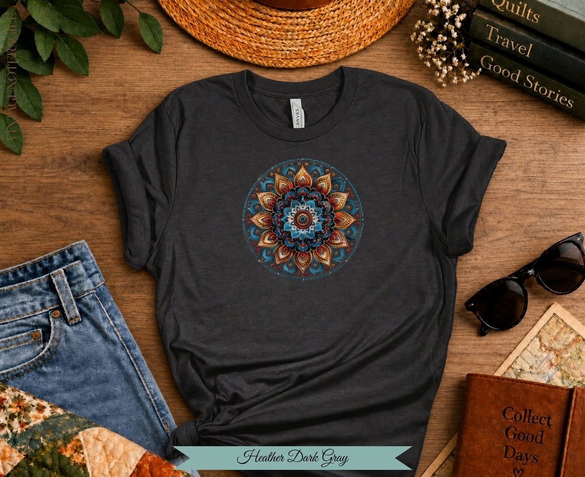 Dark gray t-shirt with a colorful mandala graphic, featuring jeans and accessories.