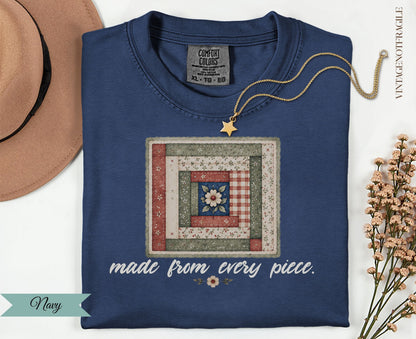 Navy t-shirt with quilt design and text "made from every piece."