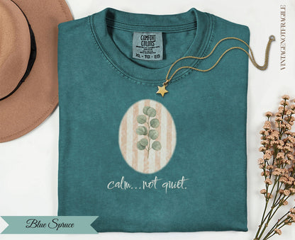 Comfort Colors teal t-shirt with oval leaf design and "calm...not quiet" text.