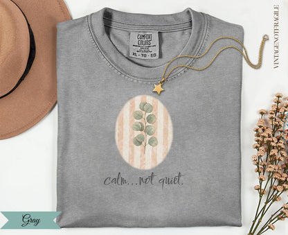 Gray Comfort Colors t-shirt with a watercolor branch and "calm...not quiet" text.