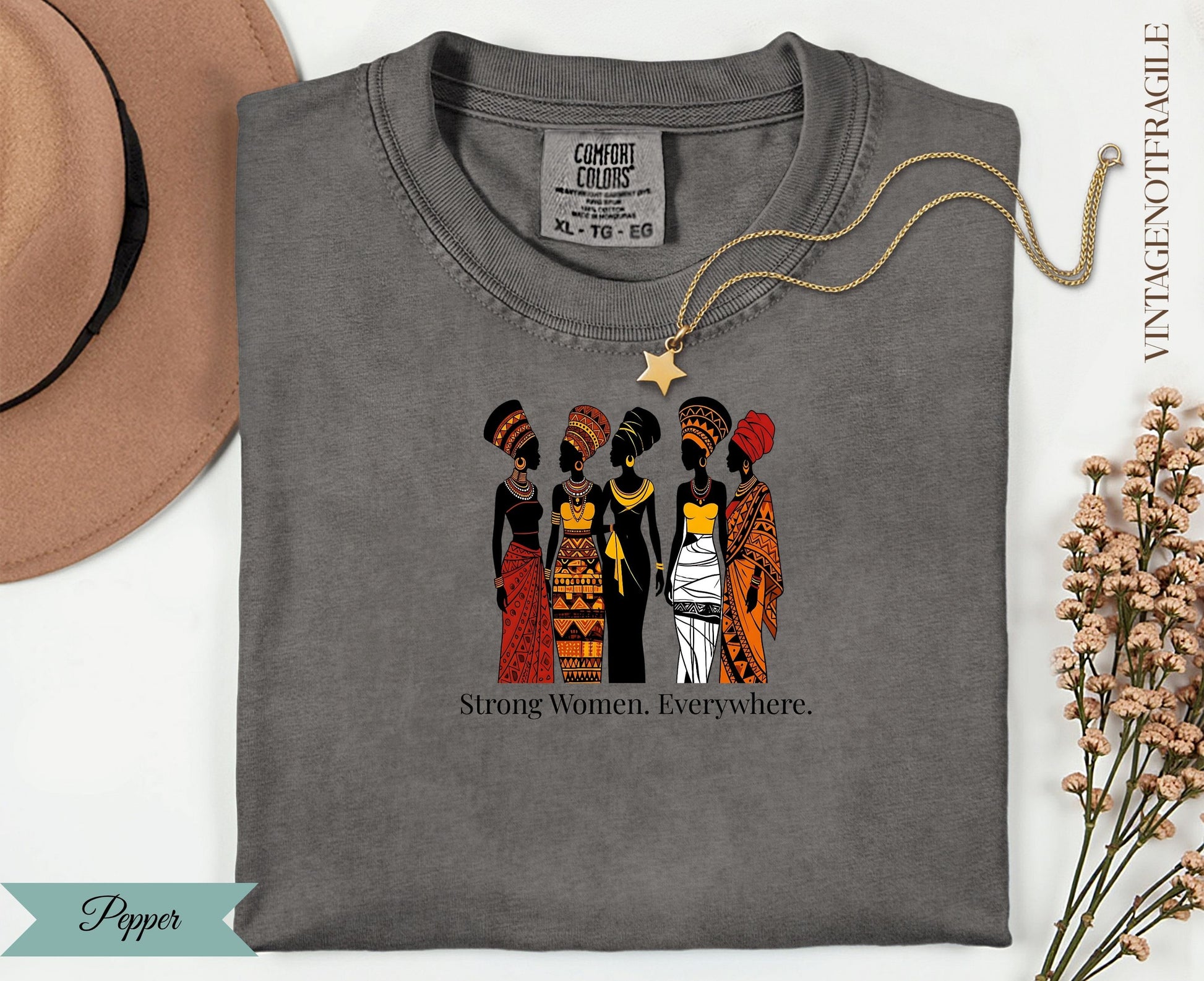 Comfort Colors t-shirt with graphic of five women and text "Strong Women. Everywhere."