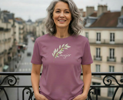Woman in mauve t-shirt with olive branch graphic and "mujer" text.