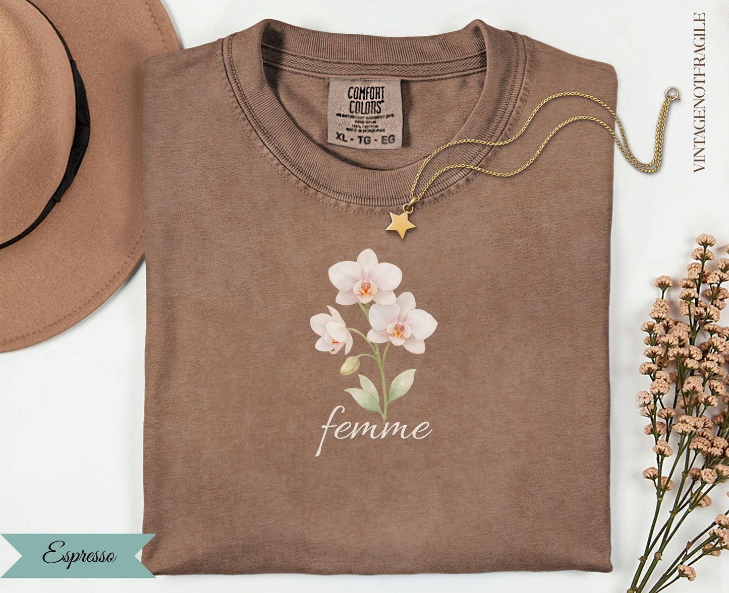 Brown Comfort Colors t-shirt with "femme" text and white orchid graphic.