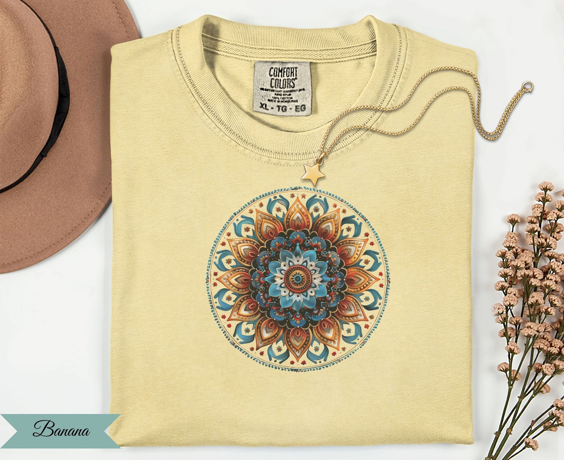 Yellow t-shirt with colorful mandala design and "Banana" text.