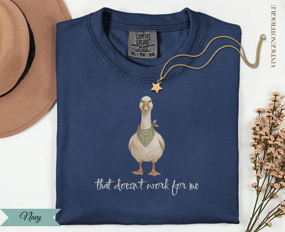 Navy t-shirt with a goose wearing a bandana and a star, and the text "that doesn't work for me".