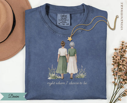 T-shirt with two women holding hands and text "right where I choose to be".