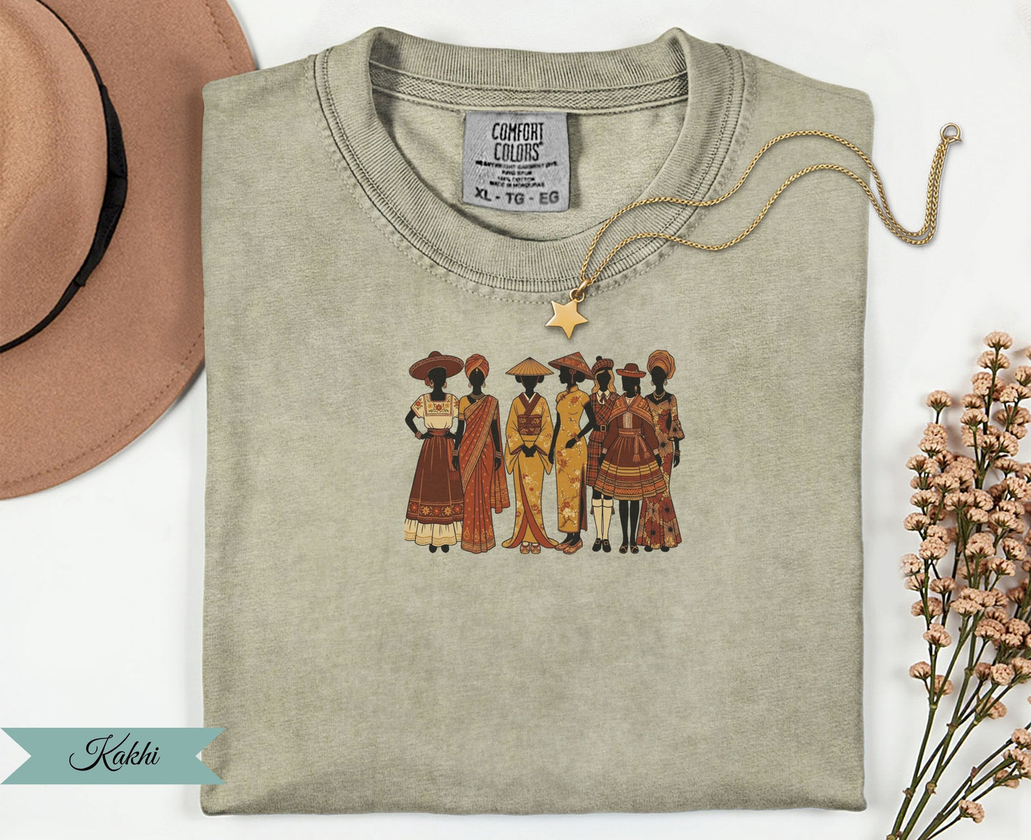 T-shirt featuring a graphic of diverse women in traditional attire.