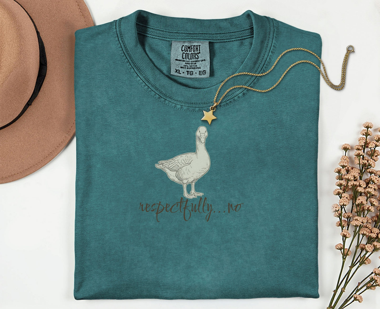 Teal Comfort Colors t-shirt with goose graphic and "respectfully...no" text.