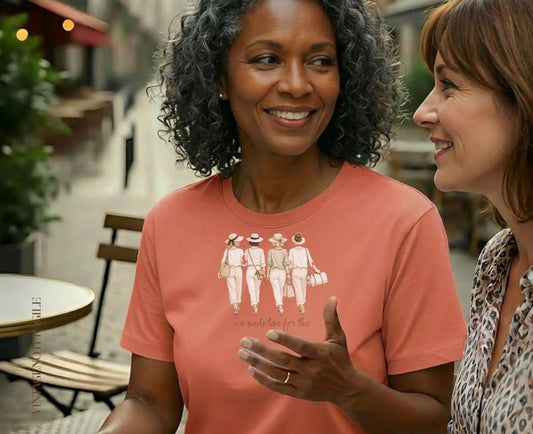Coral t-shirt with illustration of four women walking, text "We made time for this".