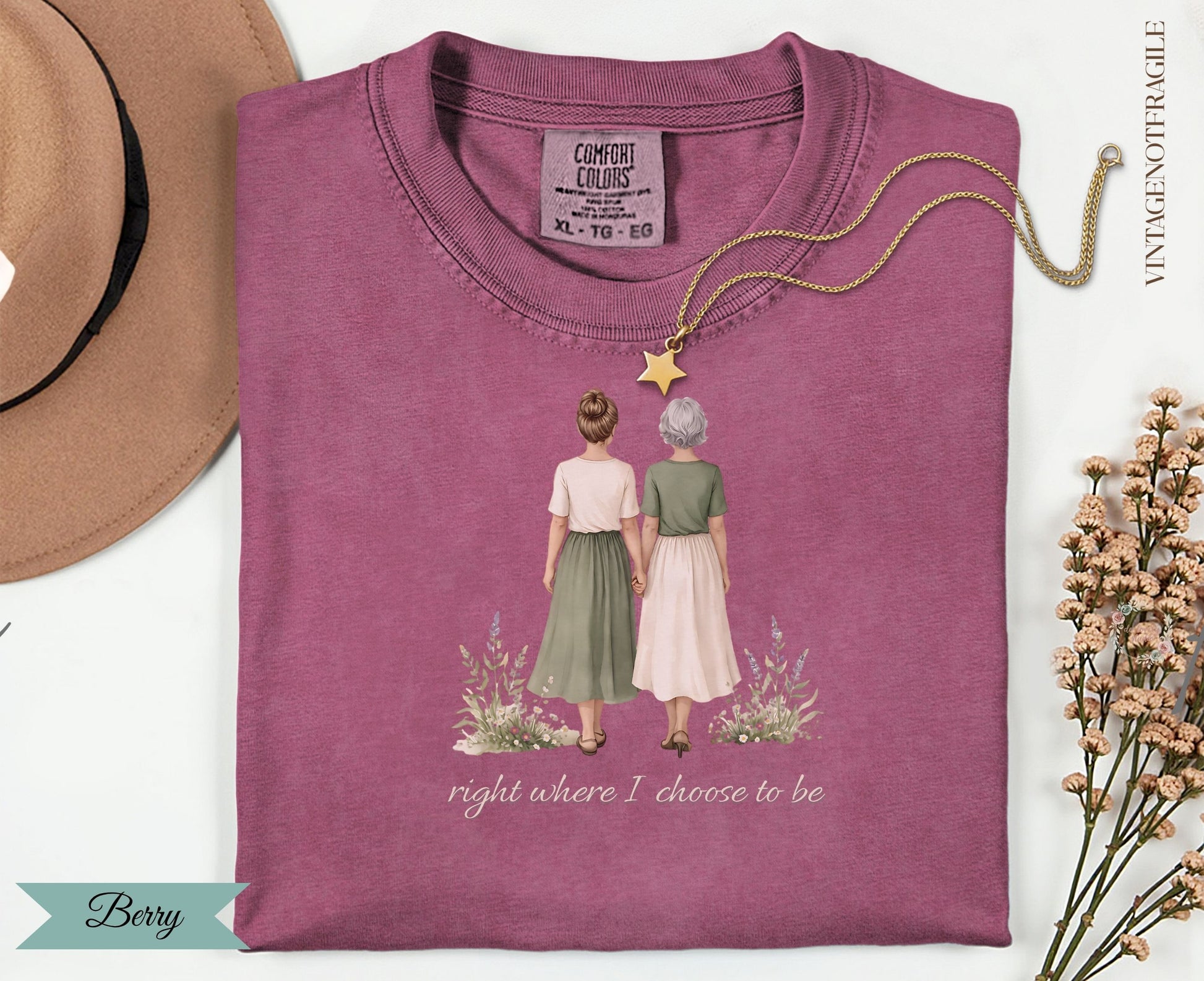 T-shirt with two women holding hands and text "right where I choose to be".