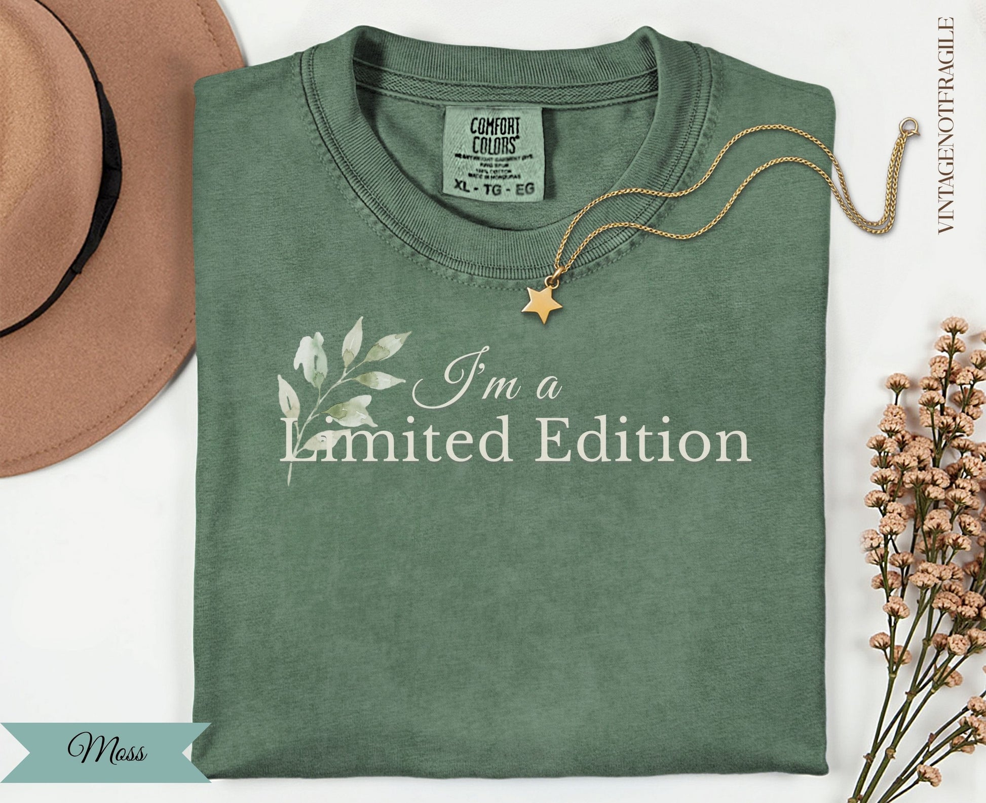 Green t-shirt with "I'm a Limited Edition" text and floral design.
