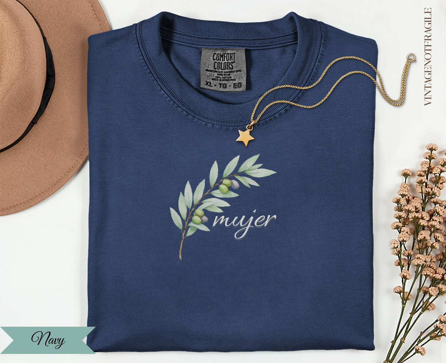 Navy t-shirt with olive branch graphic and "mujer" text.