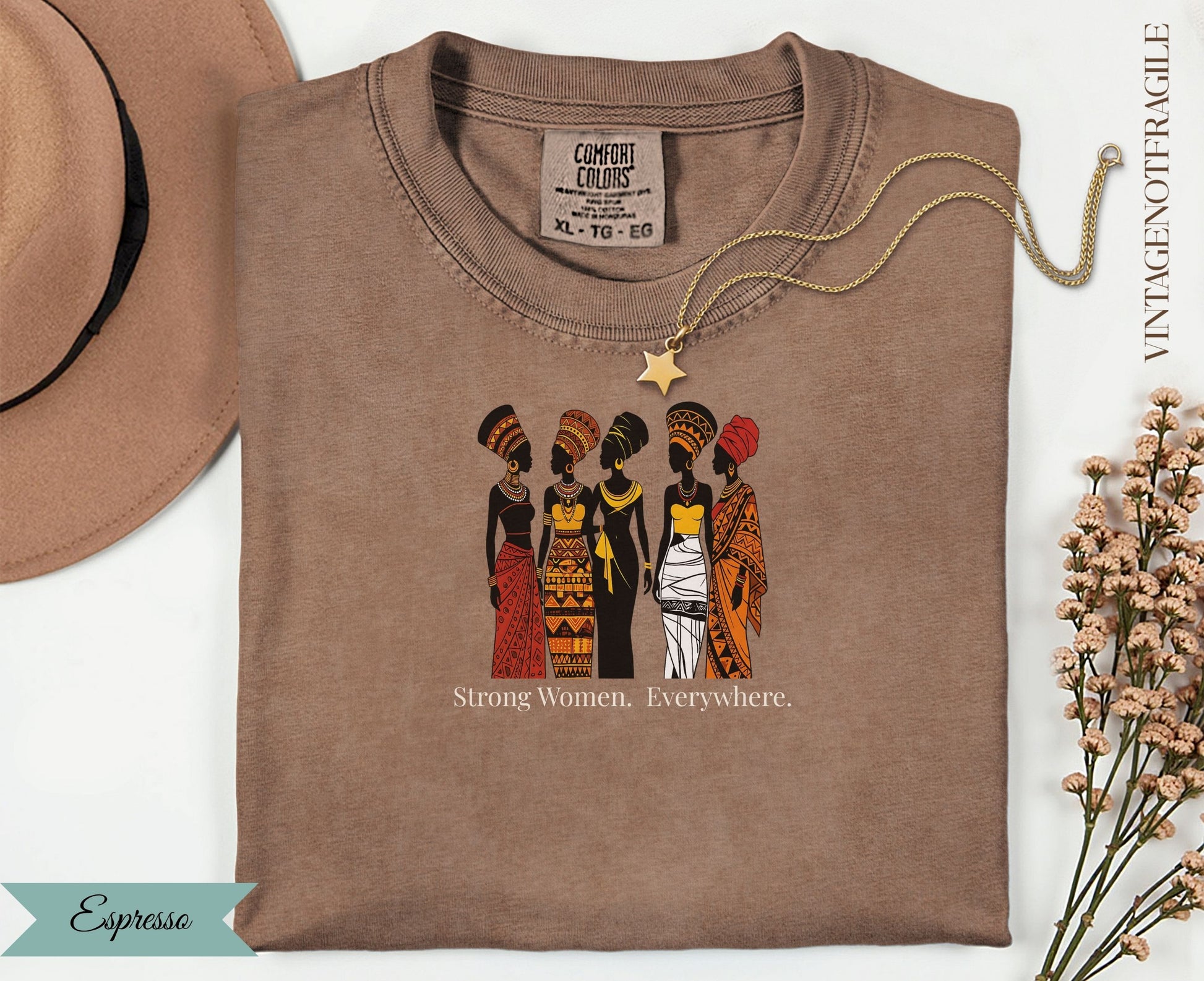 Espresso Comfort Colors t-shirt with graphic of five women and text "Strong Women. Everywhere."