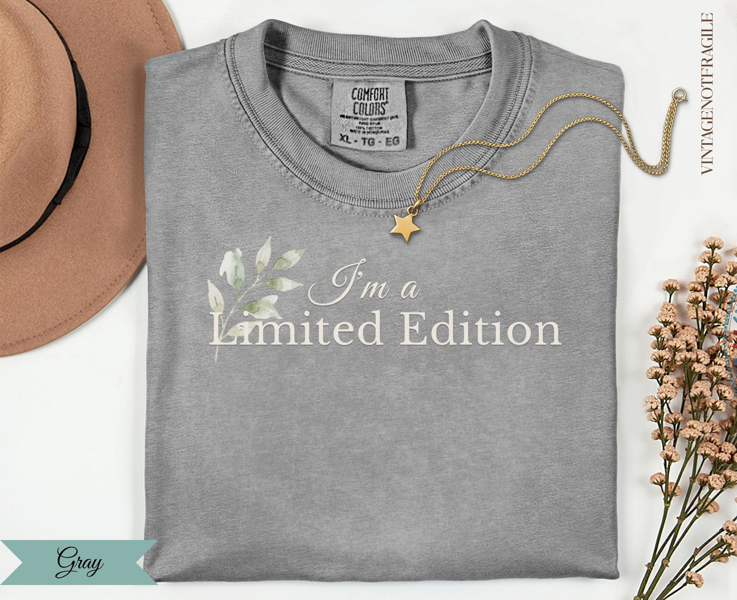 Gray Comfort Colors t-shirt with "I'm a Limited Edition" and floral graphic.