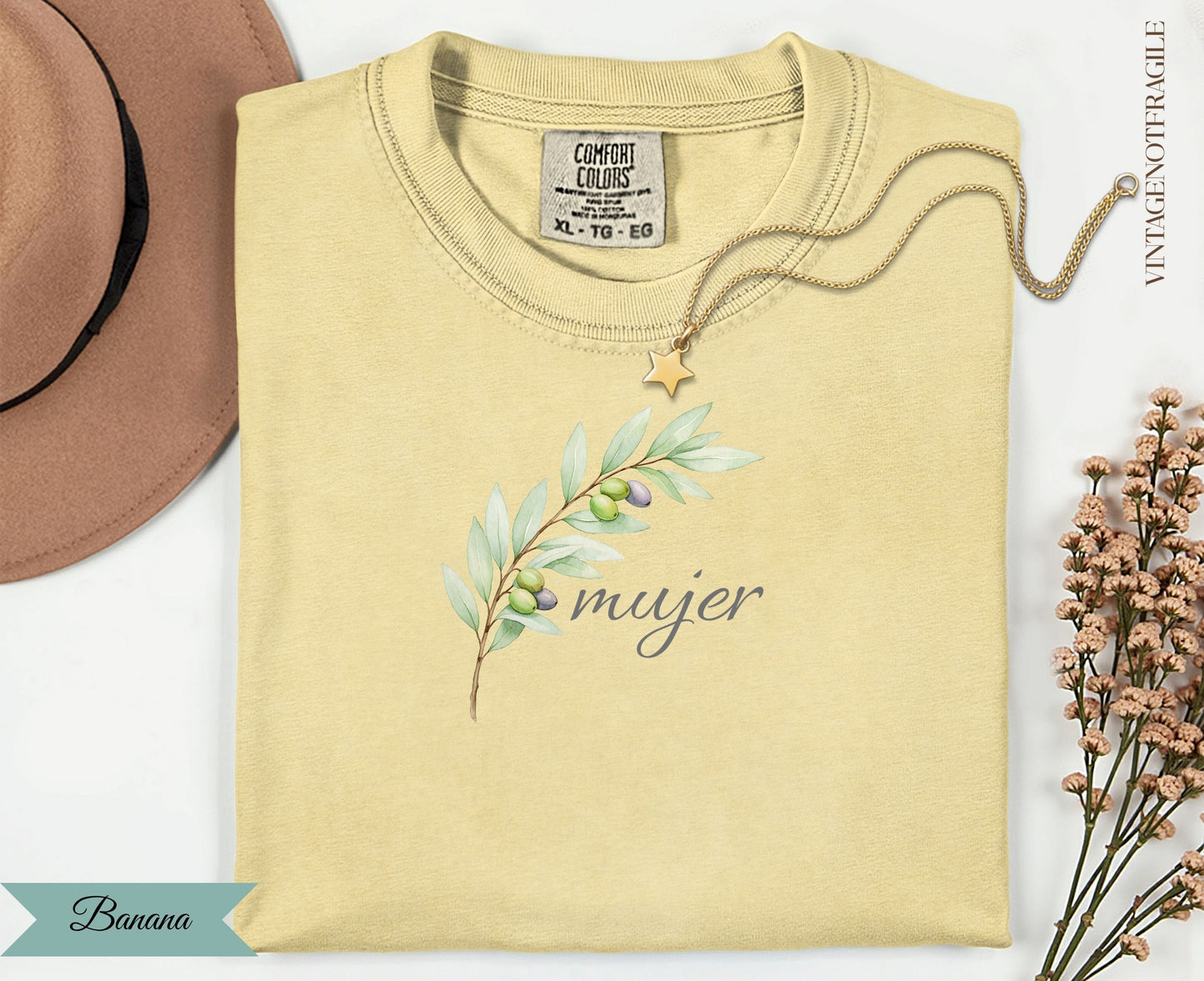 Cream t-shirt with olive branch graphic and "mujer" text.