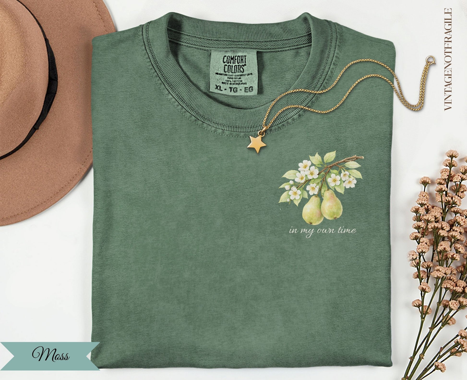 Green Comfort Colors t-shirt with pear branch and "in my own time" text.